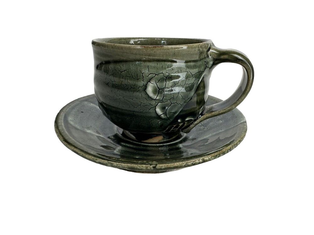 artisan handmade pottery cup saucer set